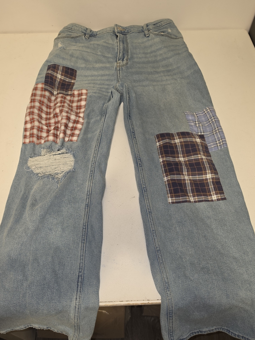 Hollister Co. ultra high rise dad jeans with plaid patches in red, white